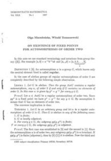 On existence of fixed points for automorphisms of order two